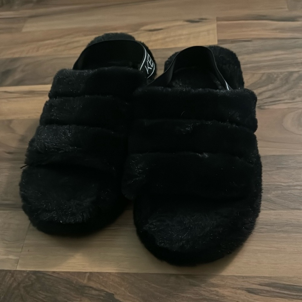 Fluffy black slippers